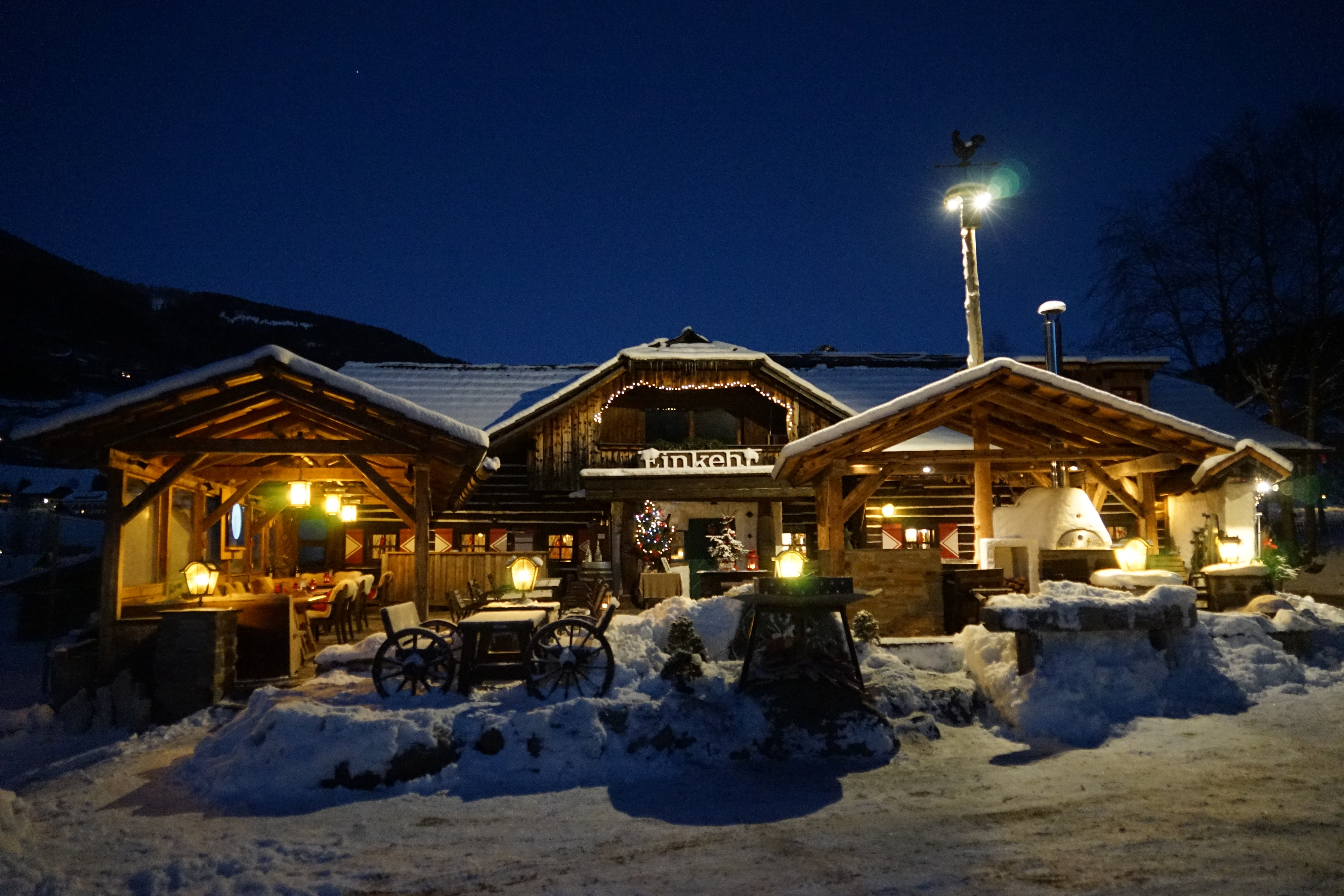 The restaurant Einkehr from the outside covered with snow